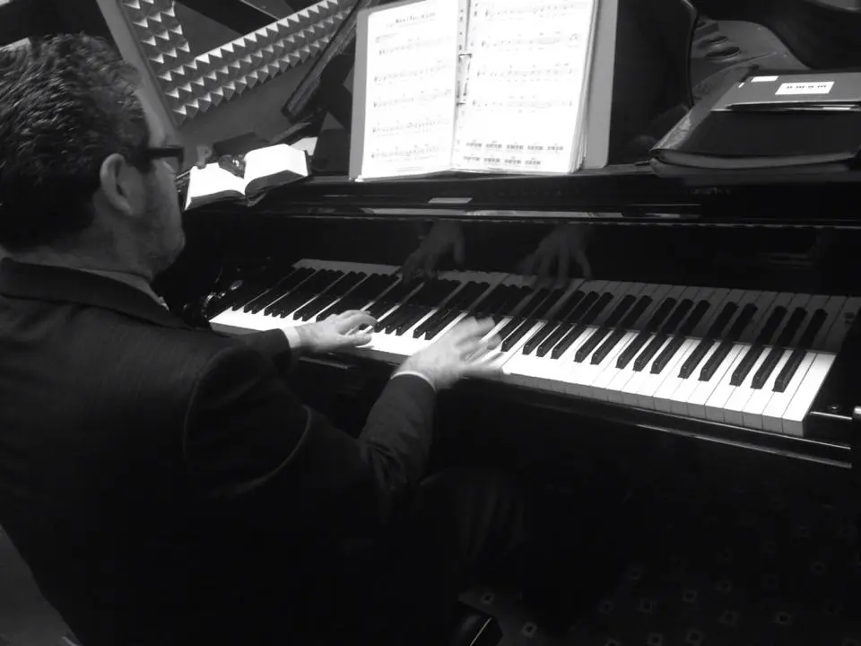 wedding pianist playing during a marriage ceremony.