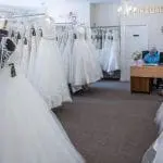 A wedding dress shop in the UK with an extensive collection of stunning wedding dresses on display.