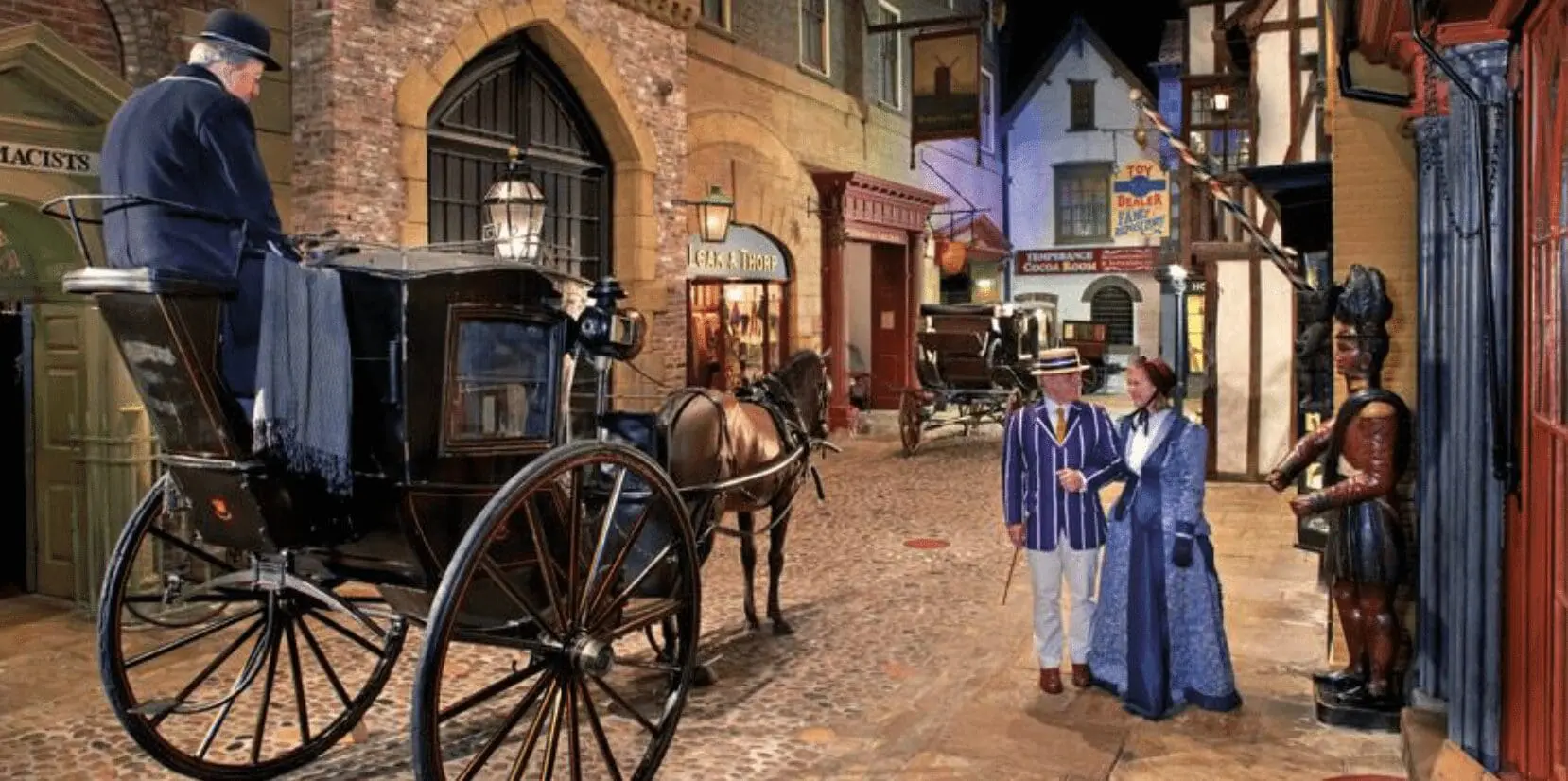 A man and woman are walking down a narrow street with a horse drawn carriage, possibly indicating their involvement in wedding planning or the wedding business.