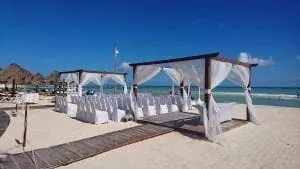 shaded area on a sandy beach for a destination wedding.