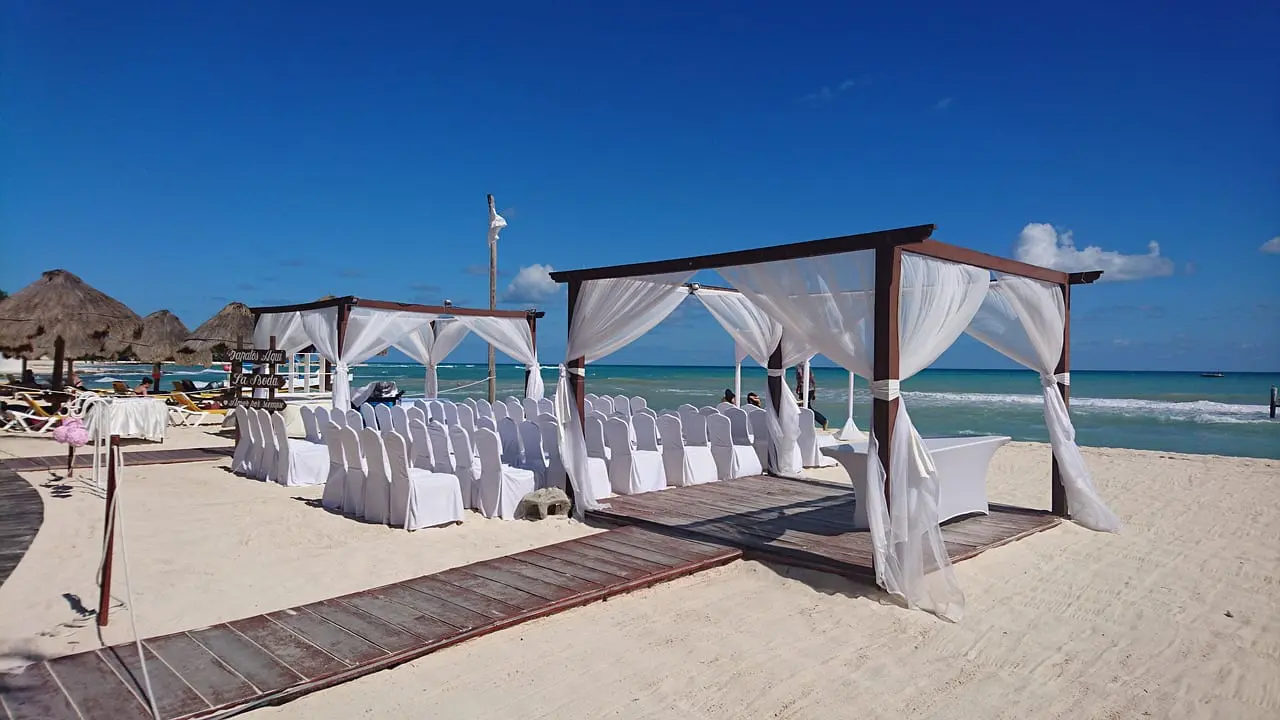 shaded area on a sandy beach for a destination wedding.