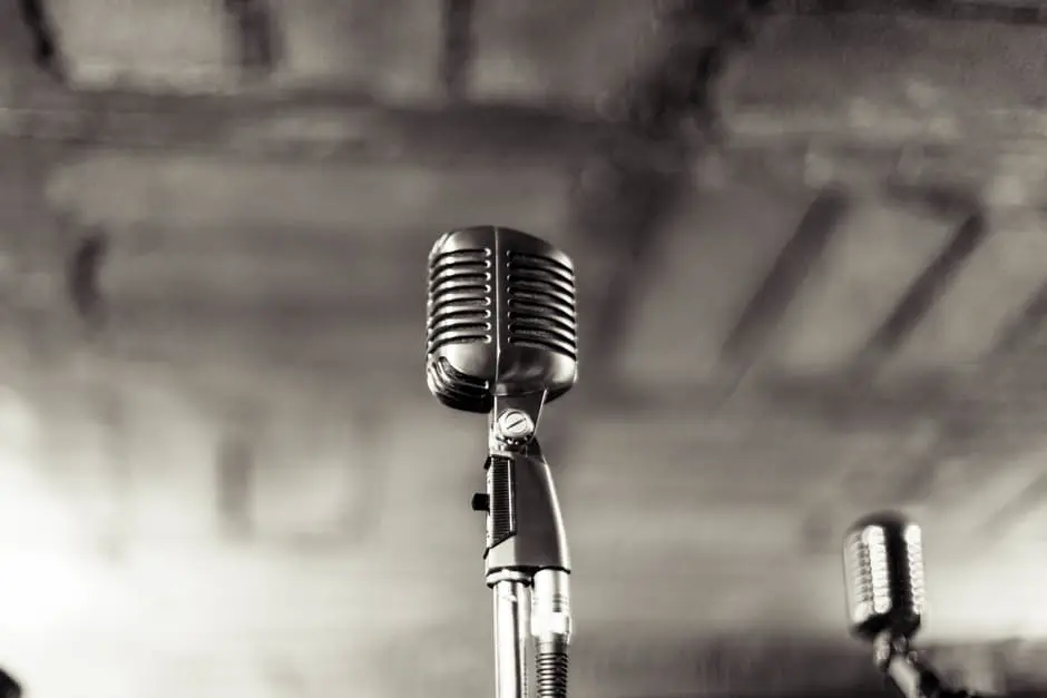 A black and white photo of microphones, perfect for wedding planning.