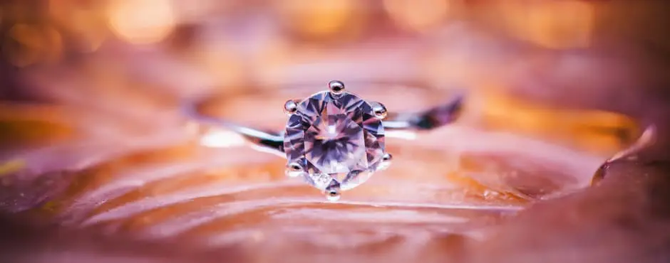 A wedding engagement ring with a marquise cut diamond.