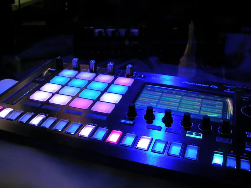 A dj controller with colorful lights on it, perfect for planning memorable weddings.