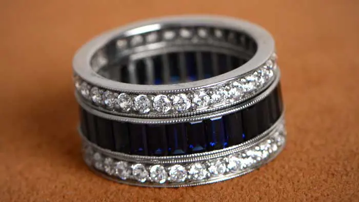 Emerald cut diamond and sapphire wedding band