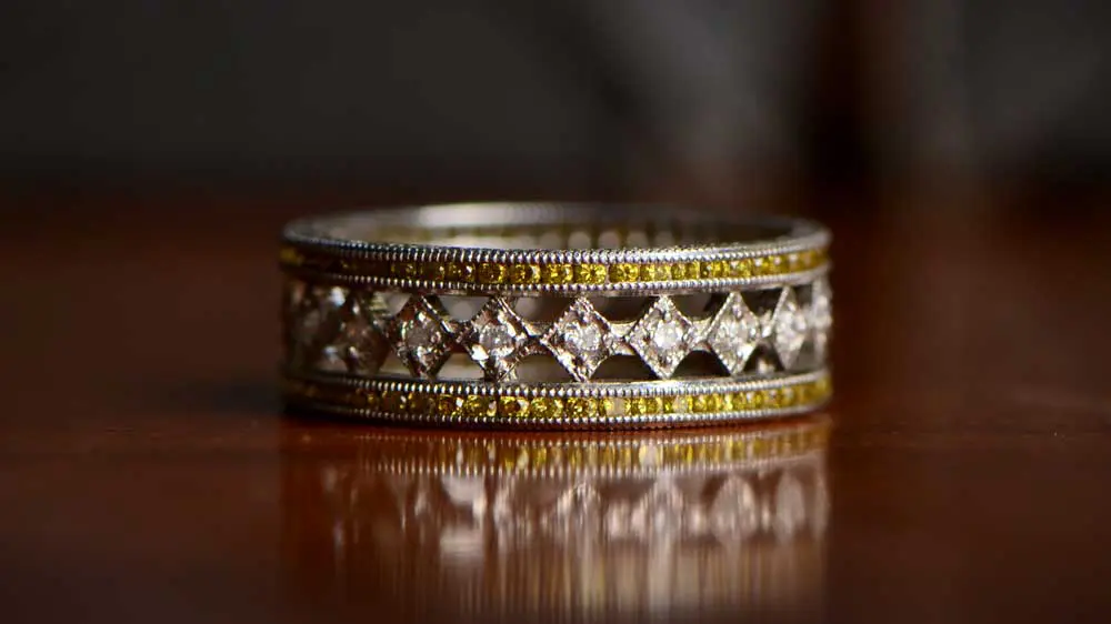 Yellow gold trim wedding band