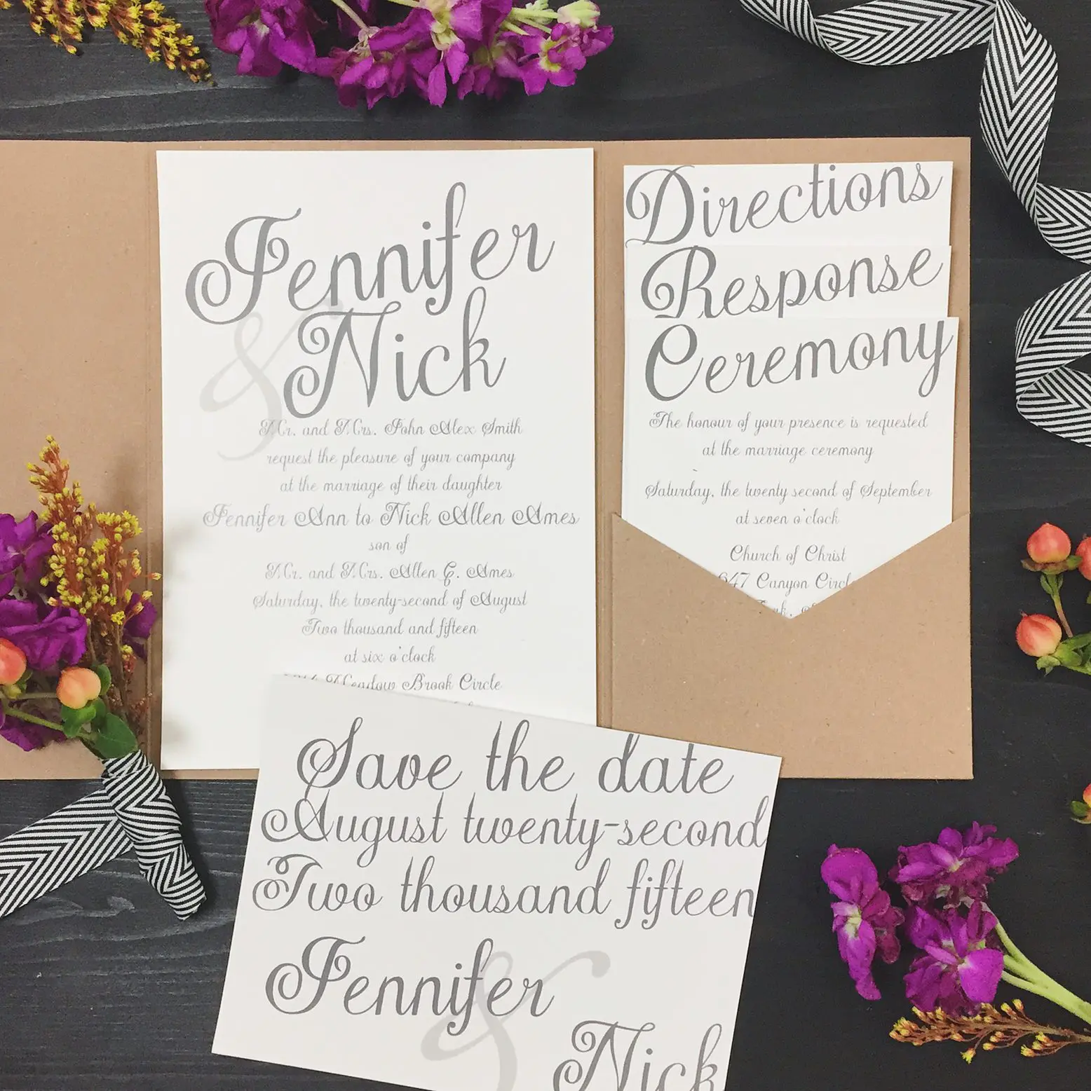 Wedding invitations for Jennifer and Nick, meticulously crafted as part of their wedding planning, featuring details about the ceremony and RSVP, surrounded by sprigs of purple and red flowers.