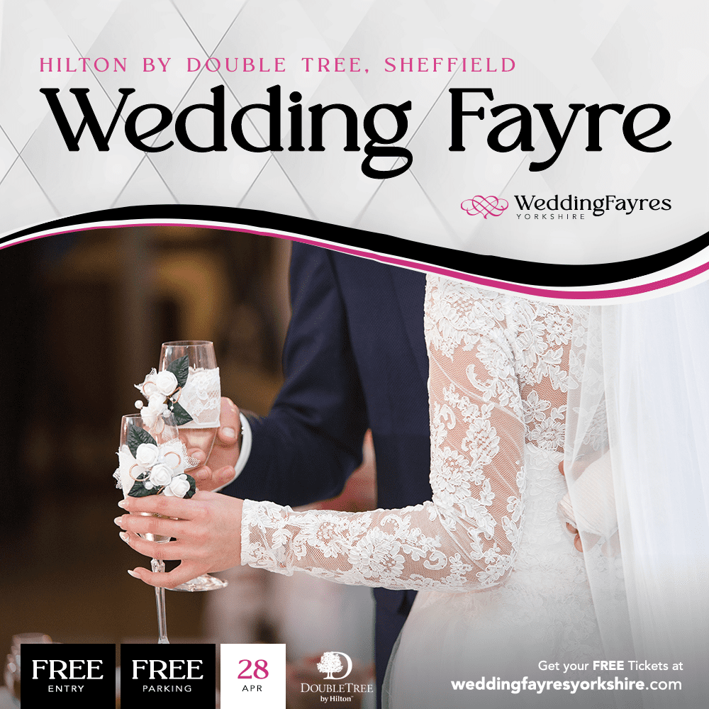 Advertisement for a wedding fair event at hilton doubletree sheffield, featuring a close-up of a bride and groom toasting with champagne.