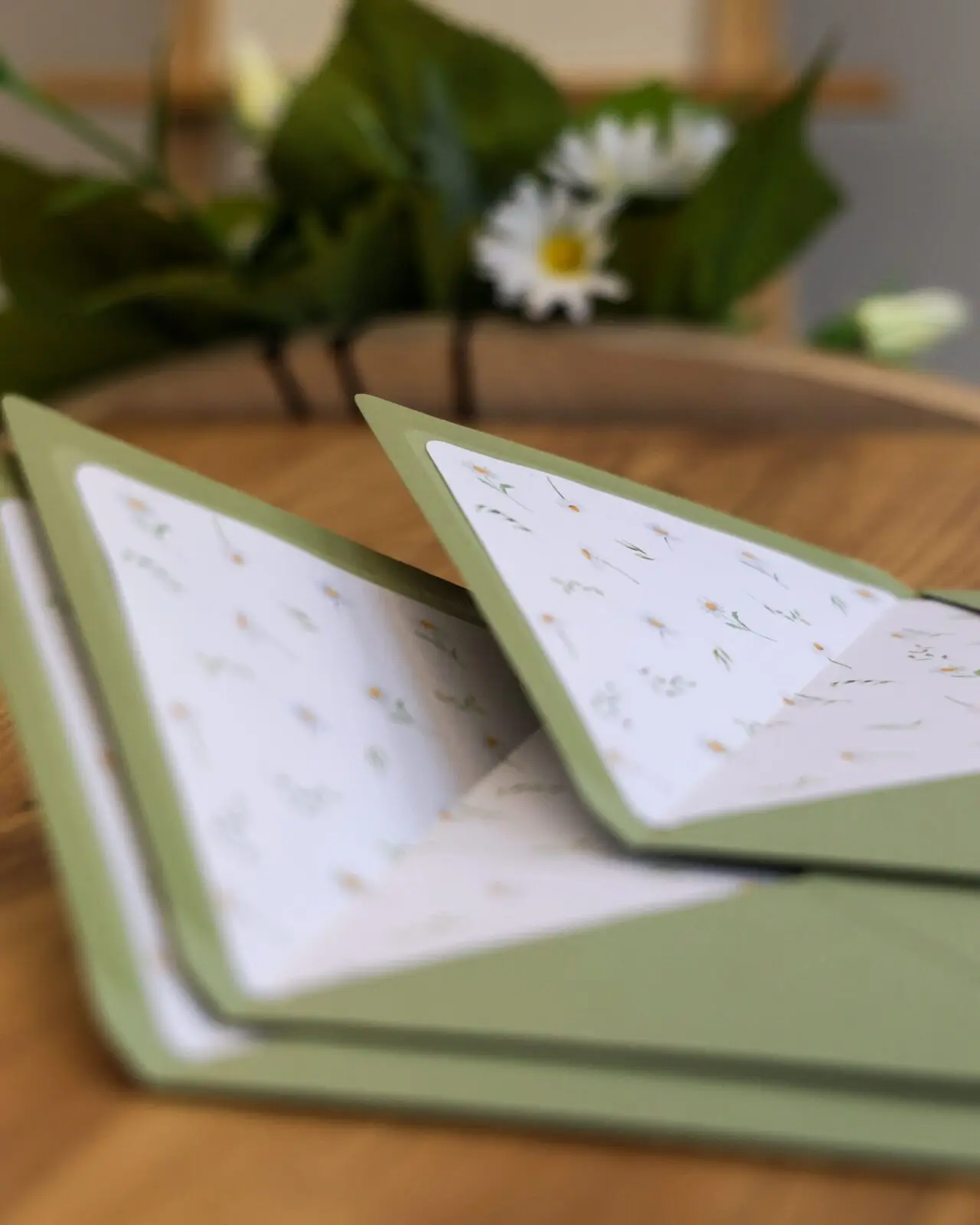 Sage green environmentally friendly envelopes for wedding invitations.