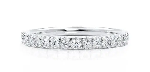 A white gold ring featuring a continuous row of small round diamonds set along the band.